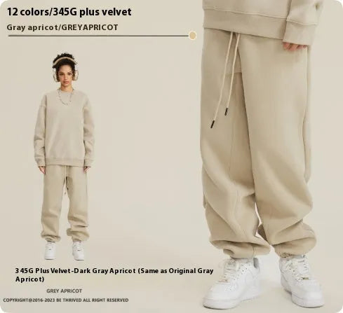 Men's solid colour cotton velvet casual sweatpants with elasticated waist and ankle cuffs.
