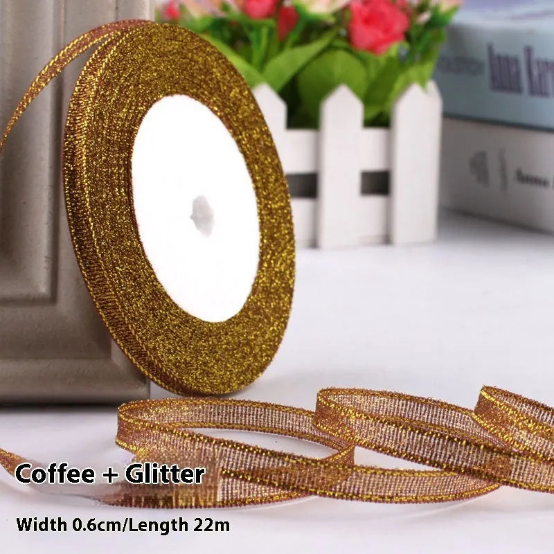 Roll of narrow 0.6cm wide polyester satin ribbon in a choice of colours, showing 22 metre length.