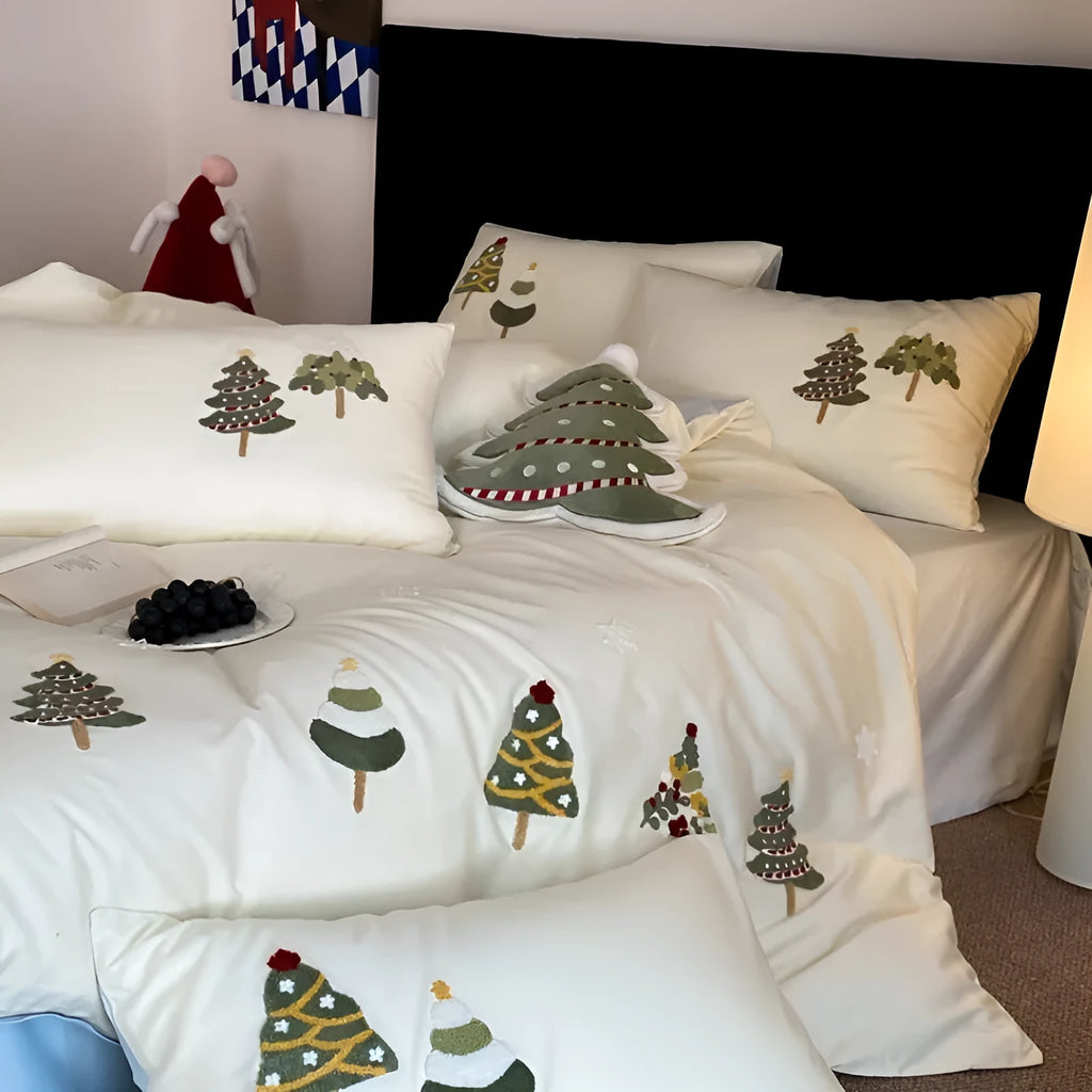 Cotton four-piece bedding set with embroidered Christmas tree towel design on duvet cover