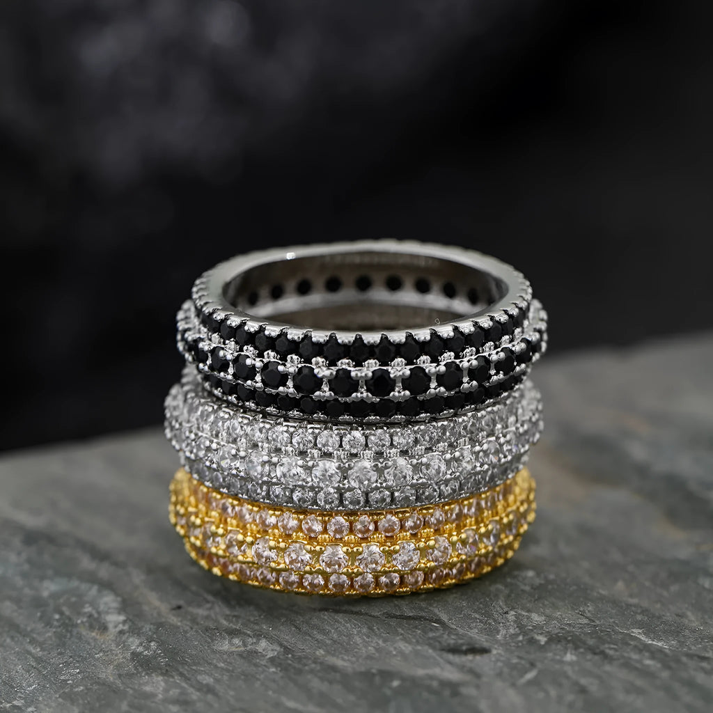 Geometric triangle zircon ring in three colour options showing detailed inlay work