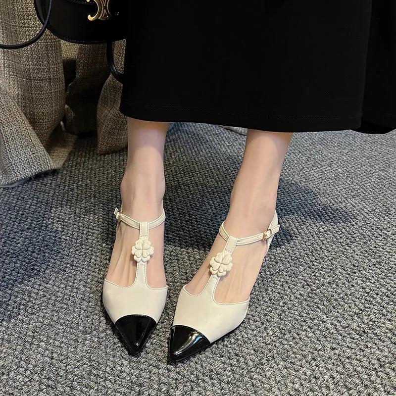 Women's gold stiletto heel pointed toe shoes with floral buckle on sheepskin leather upper