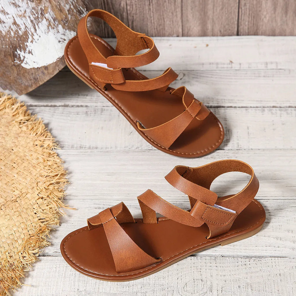 Women's flat sandals with Velcro strap in black, brown and colourful options on rubber sole