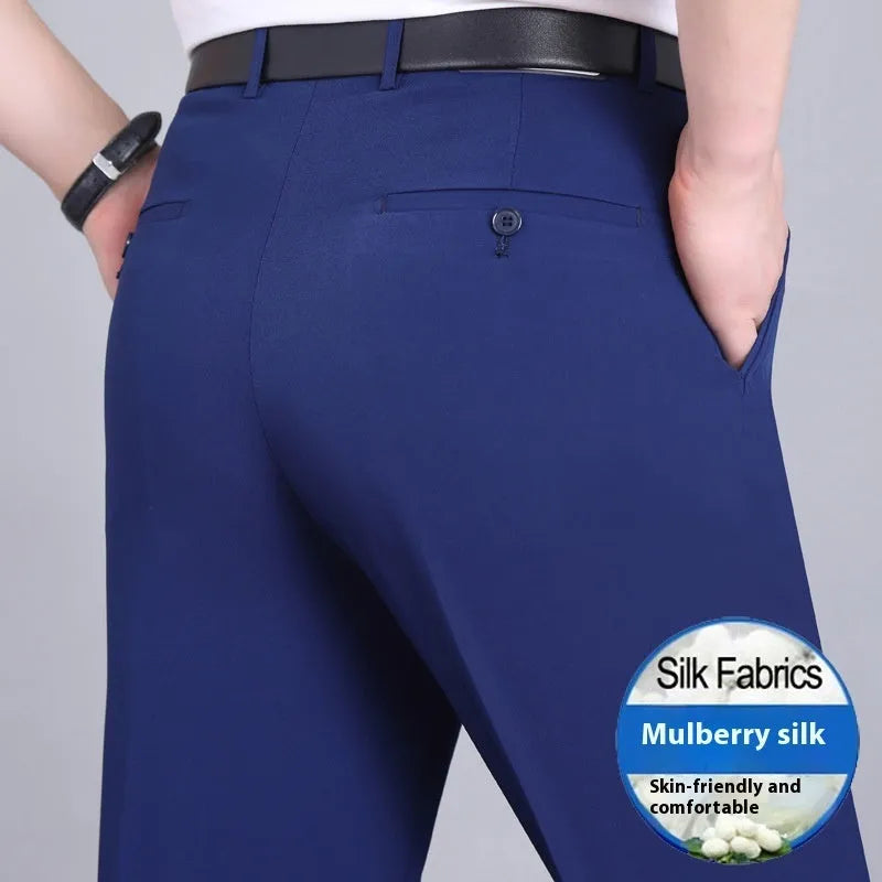 Men's straight-leg mulberry silk blend dress trousers in black on a hanger