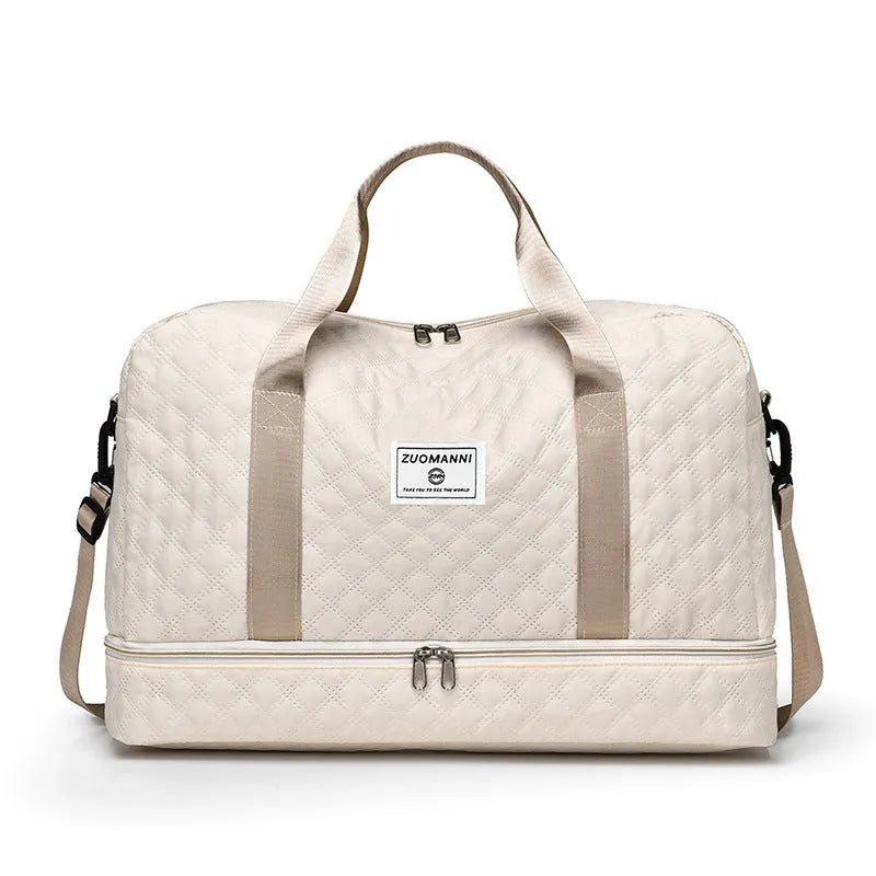 Oxford cloth travel bag with 36-55 litre capacity for leisure trips and buggy use in solid colour options