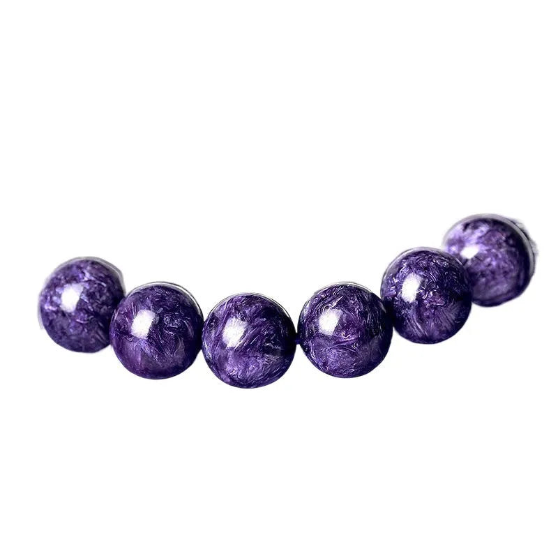 Natural transparent charoite crystal bracelet with platinum elements in four bead sizes
