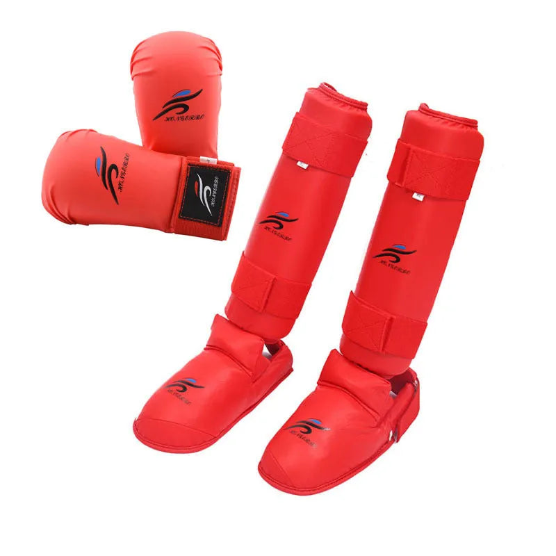 Karate taekwondo protective gear set with red leg guard, helmet, and boxing gloves for martial arts training