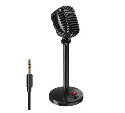 Black USB desktop computer microphone with adjustable stand on a desk.