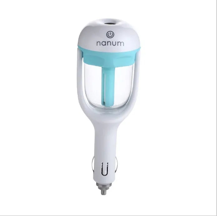 Compact blue car humidifier air purifier with essential oil diffuser function on car dashboard