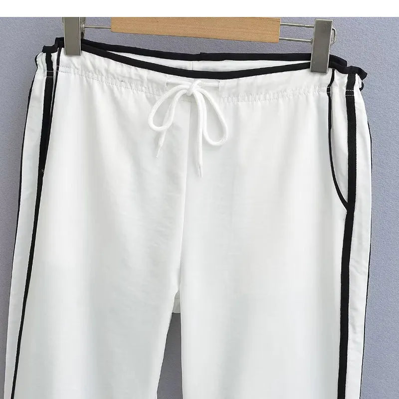Women's navy blue loose straight trousers with white ribbon parallel bar waistband detail