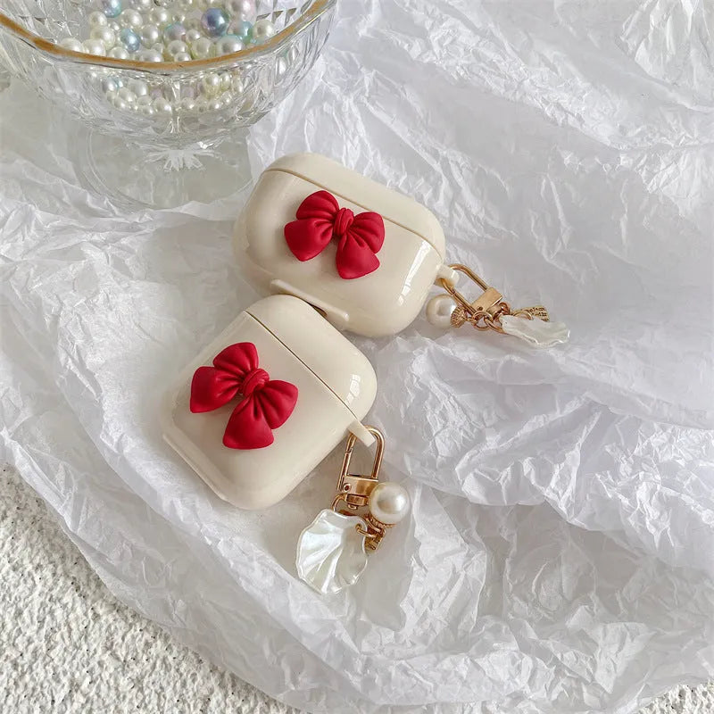 Beige red bow shell wireless earphone case for AirPods with clamshell design
