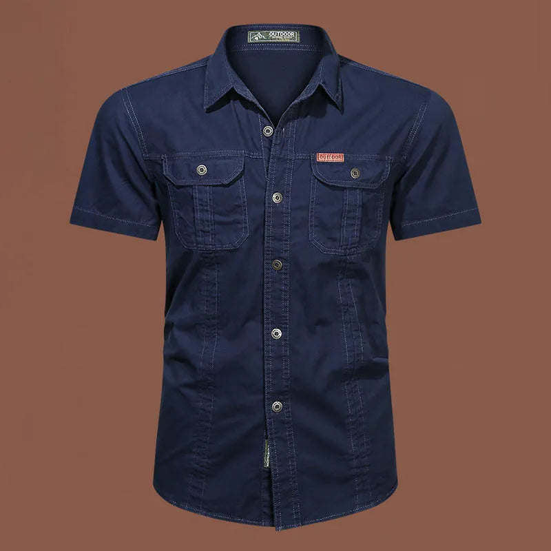 Men's short sleeve cotton work shirt in a loose fit, shown in army green colour.