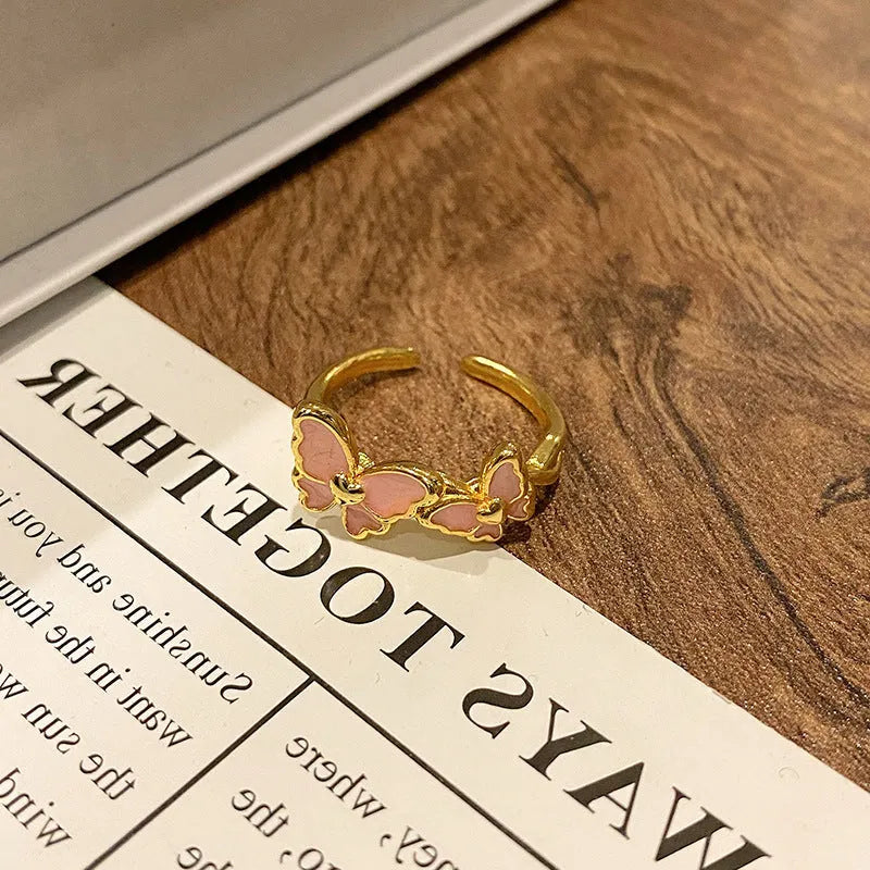 Creative Chinese butterfly women's copper ring with dripping oil treatment process in simple style.