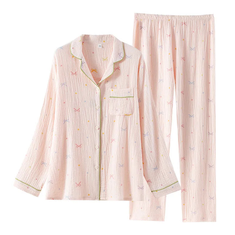 Women's cotton pajama set with long sleeves in lightweight crepe fabric, shown in pink colour