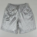 Men's black traditional Tang suit style Tai Chi shorts with an elastic drawstring waistband laid flat.