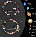 Twelve zodiac sign bracelets with natural stone beads arranged in a circle showing different designs