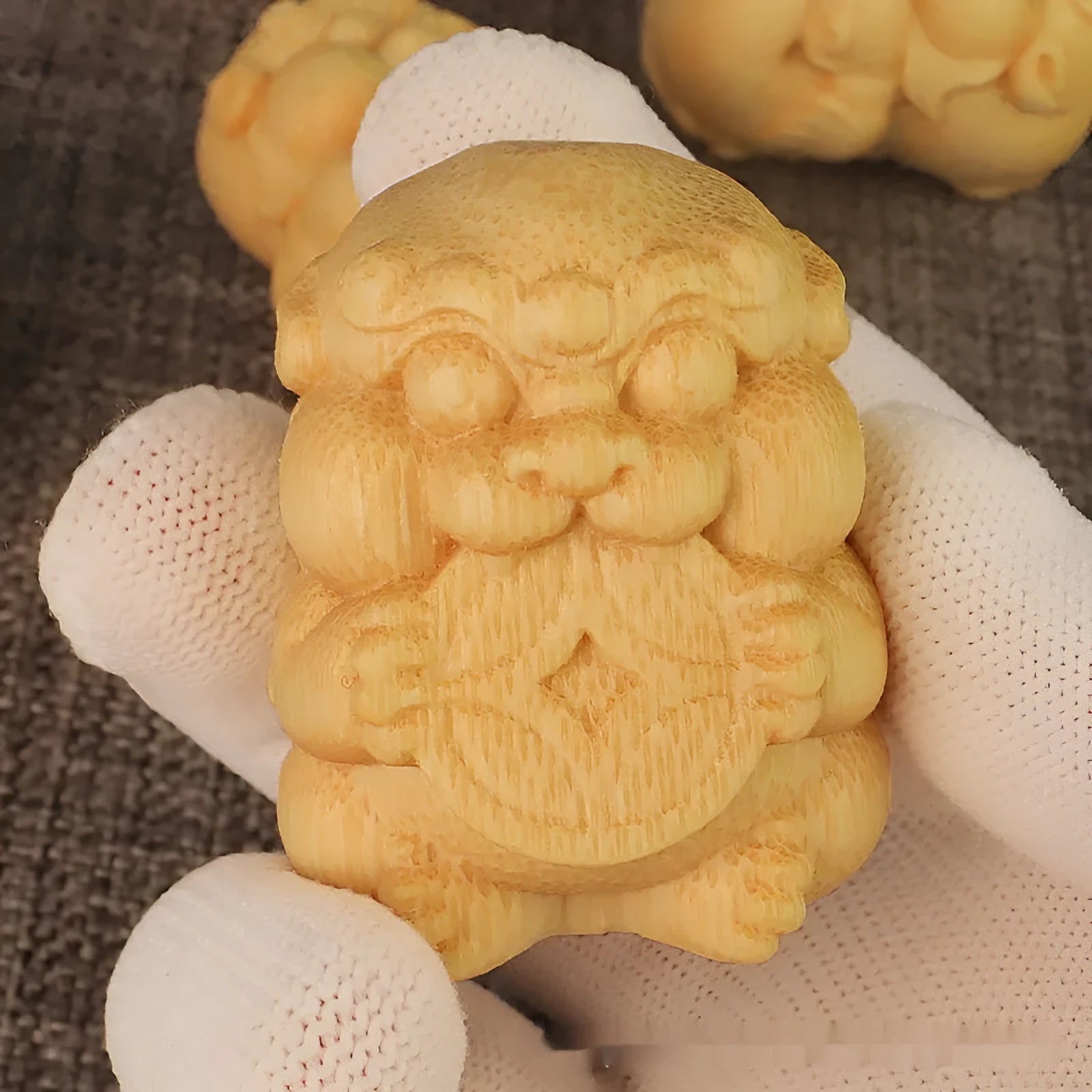 Solid bamboo carving ornament in take money coin shape showing natural wood grain