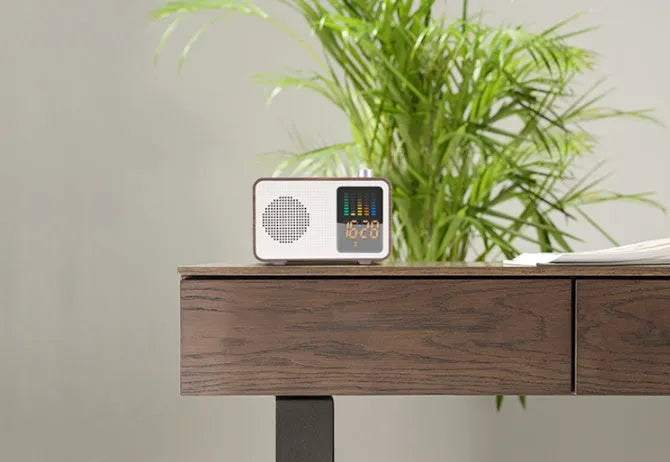 Brown retro Bluetooth speaker with vintage radio design and control knobs