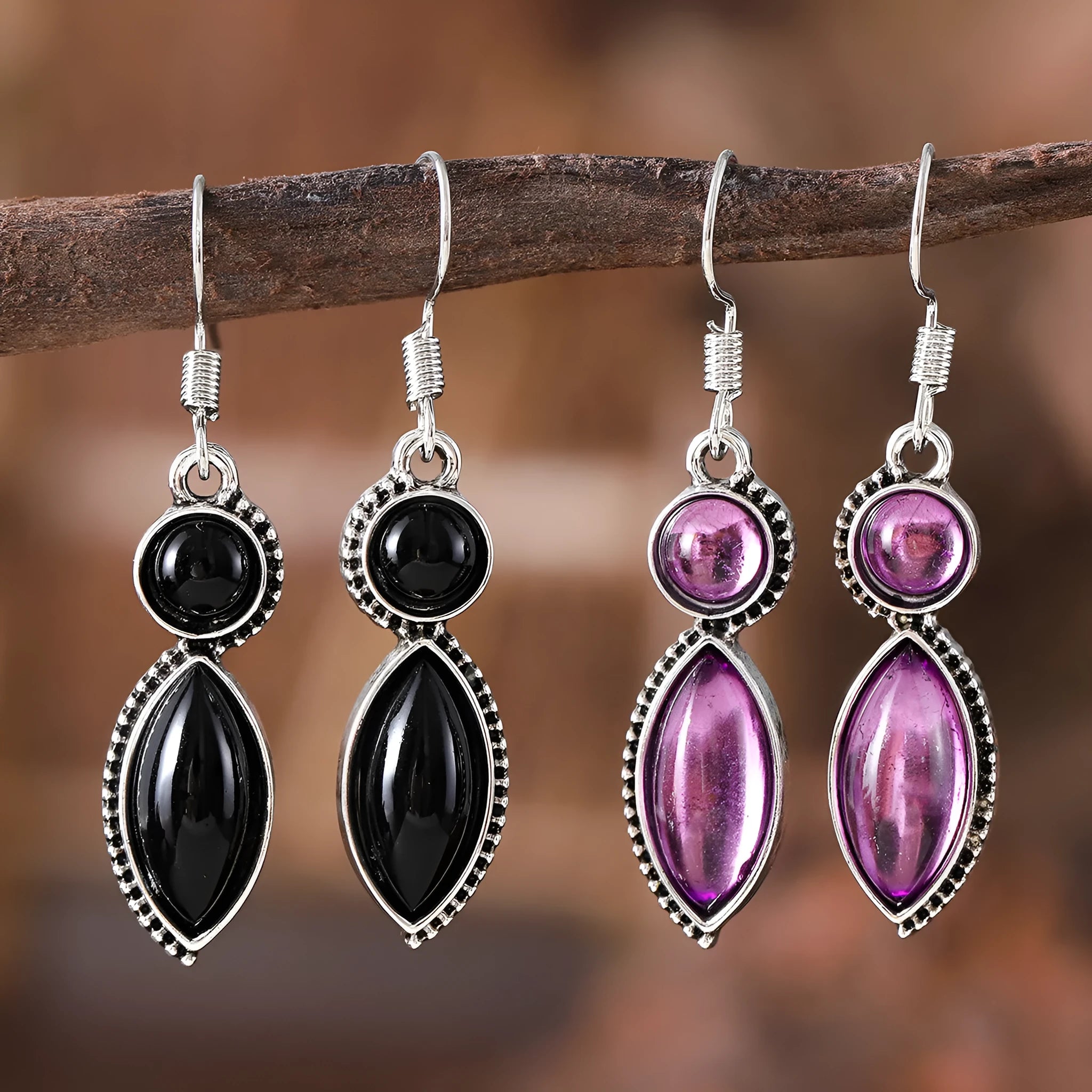 Geometric vintage pendant earrings with black and purple electroplated finish and round elements
