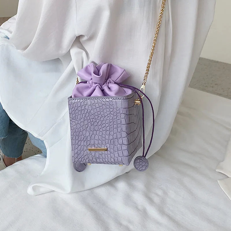 Women's small bucket messenger bag with detachable chain strap in multiple colour options