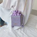 Women's small bucket messenger bag with detachable chain strap in multiple colour options
