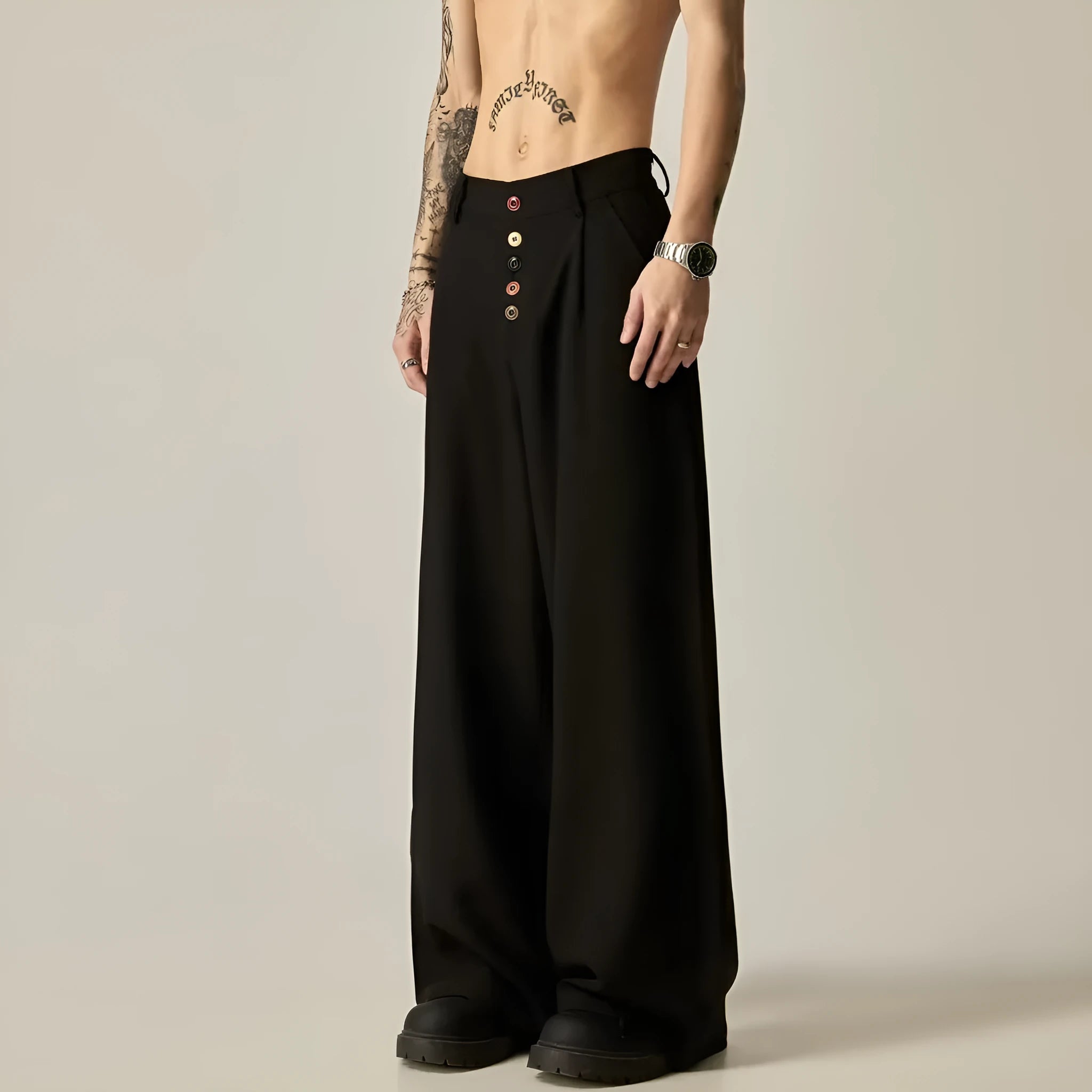Men's black wide-leg tube trousers with button fly and straight-leg design on hanger