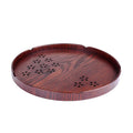 Wooden shallow serving plate with hollow cherry blossom design, 30 cm in diameter.