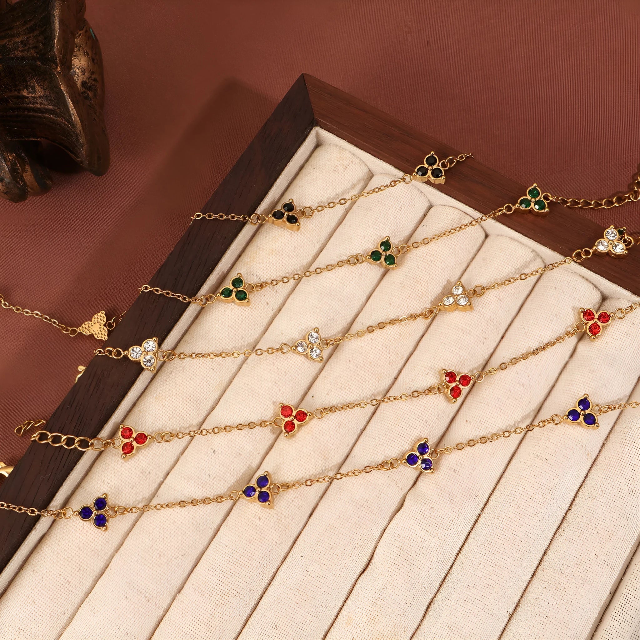 Women's geometric bracelet with triangular diamond cluster in gold or steel stainless steel with coloured stones