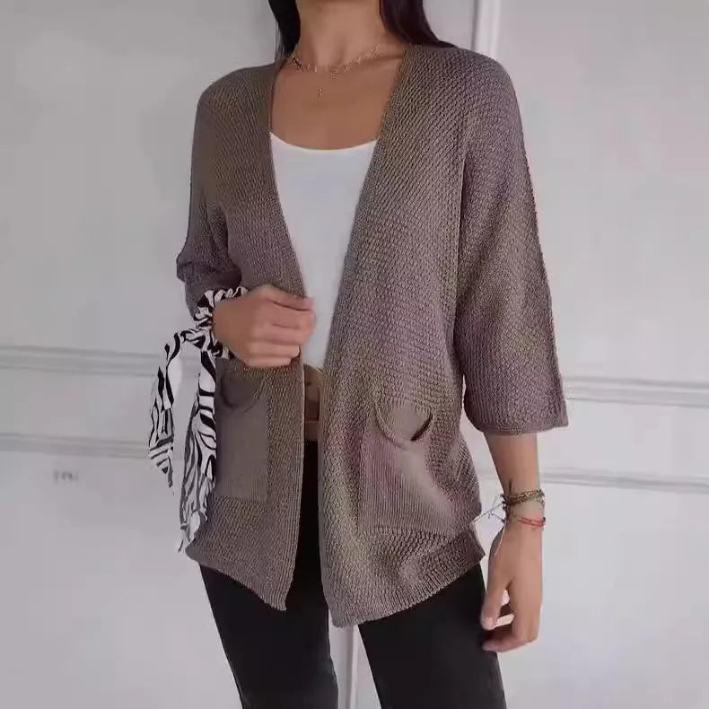 Women's waffle texture cardigan coat in army green with nine-quarter sleeves and pockets.