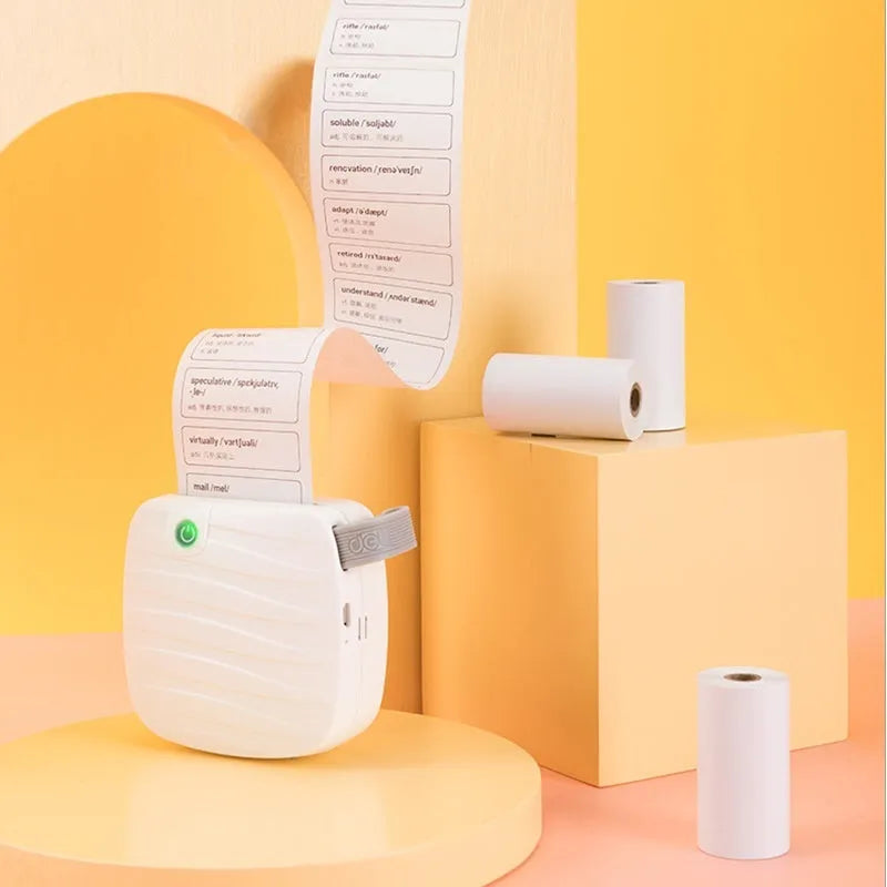 Three rolls of 57mm x 30mm thermal paper for small portable printers in packaging