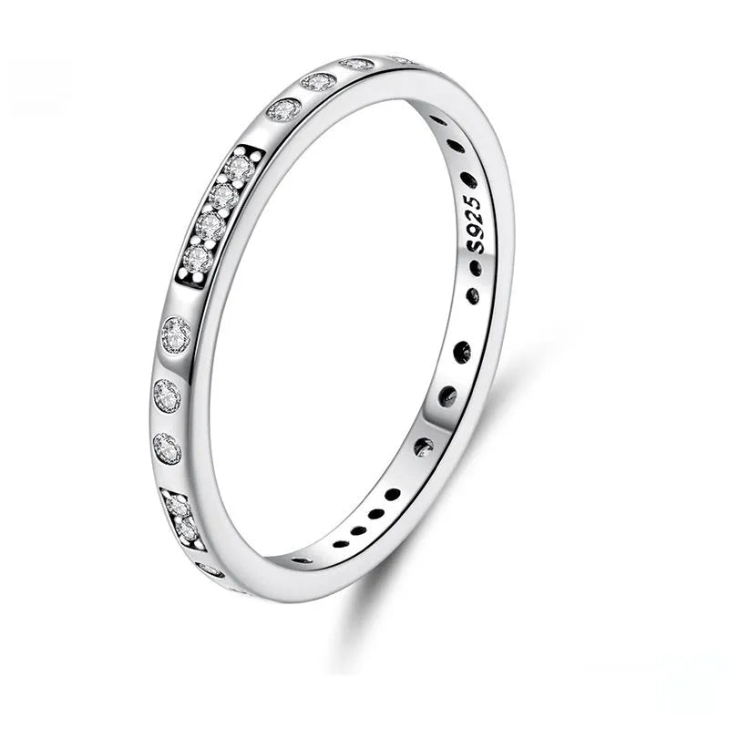Oxidised black silver 'I Love You' moss password fashion ring on a hand, showing its bracelet-style design.