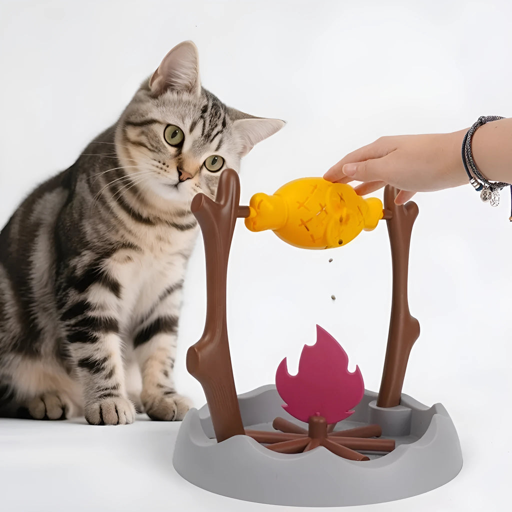 Barbecue-style tumbling cat treat feeder with dimensions 30x30x29cm