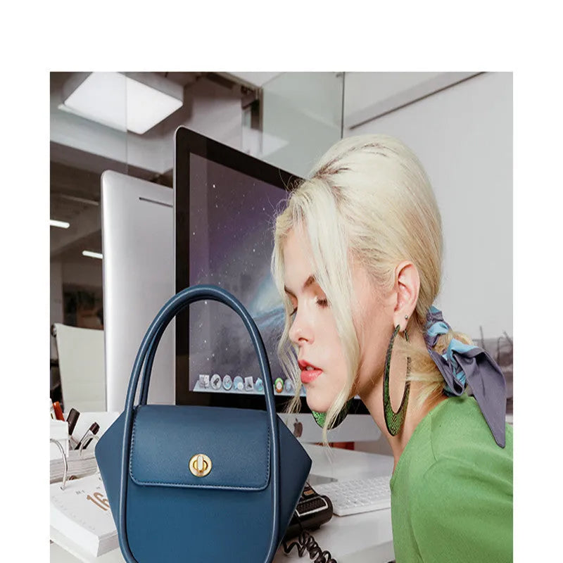 Leather wing-shaped tote cross-body bag in cow leather with single shoulder strap