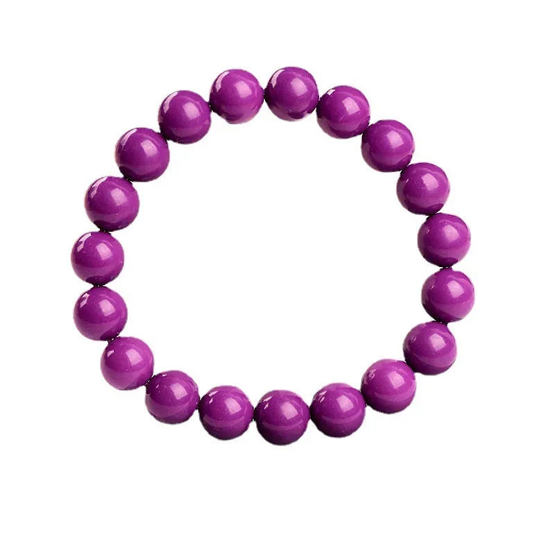 Jiuya original design purple mica crystal bracelet on a wrist, showing polished beads in a single circle.