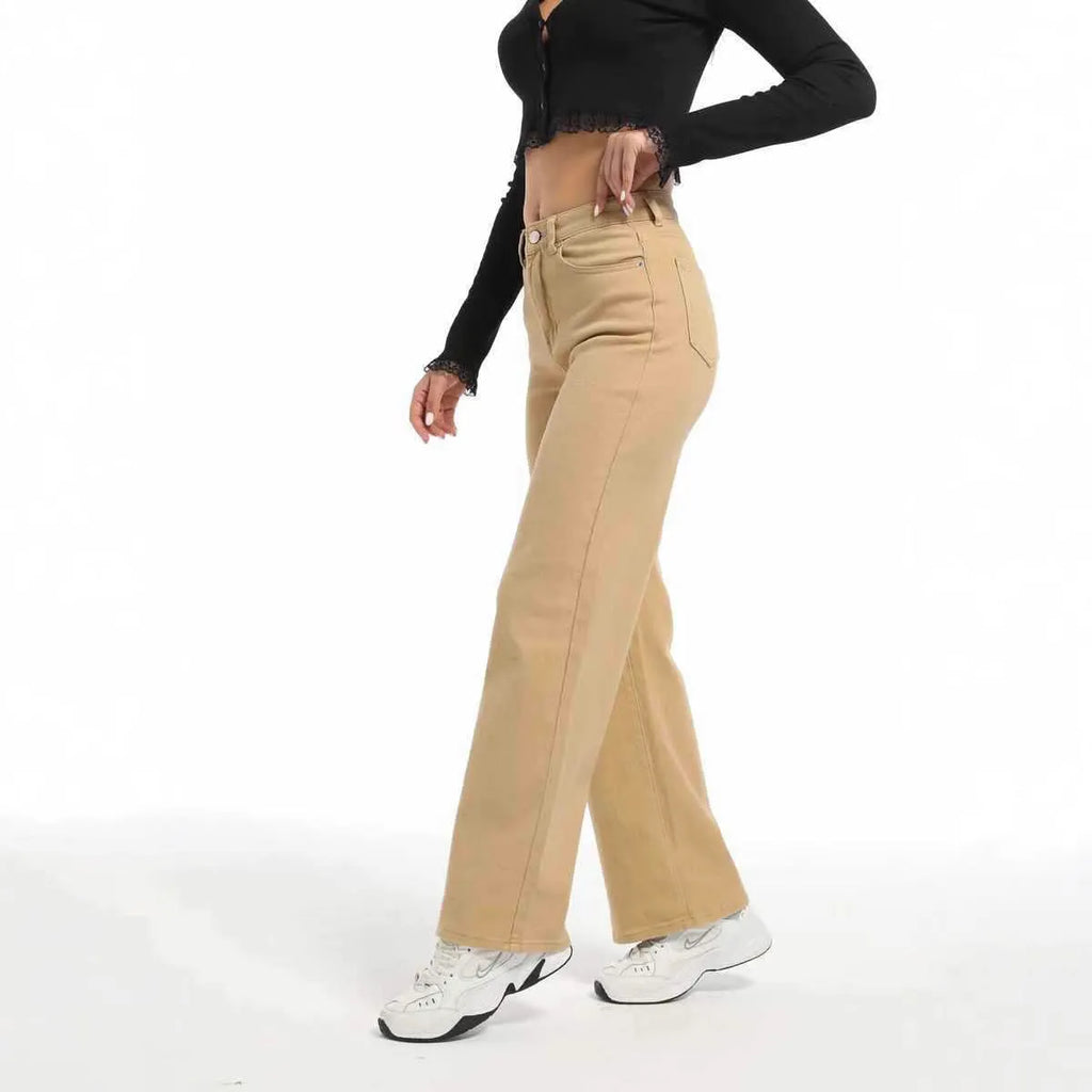 Women's apricot straight wide-leg high-waisted cotton trousers on a hanger.
