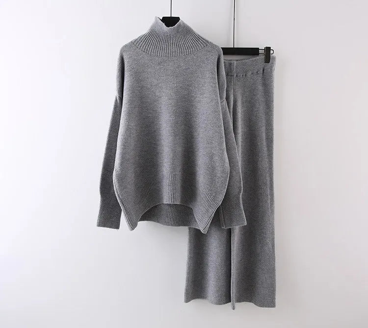 Women's casual acrylic fibre two-piece set with long-sleeve sweater and wide-leg trousers in solid colour.