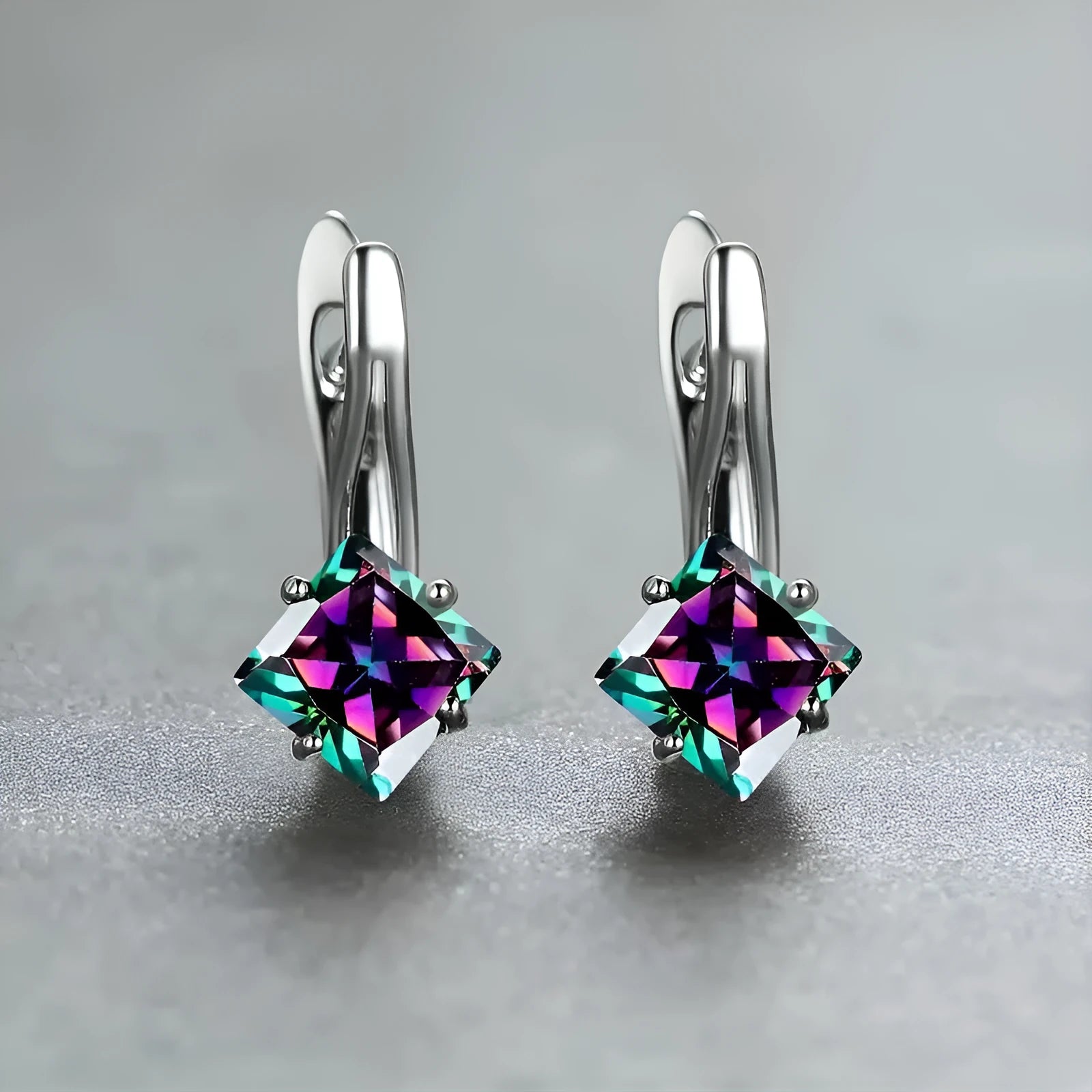 Copper women's stud earrings with diamond design and inlaid zircon in blue, green colours.