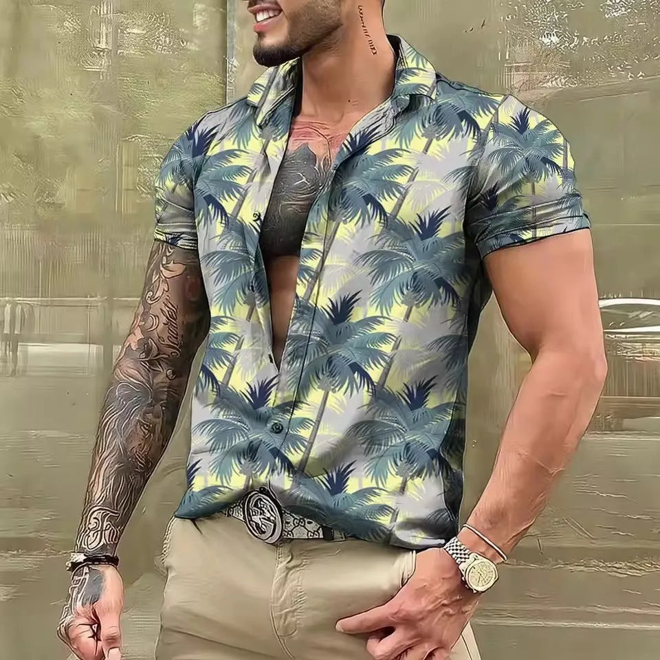 Man wearing a loose-fitting short-sleeve shirt with a colourful floral print pattern.