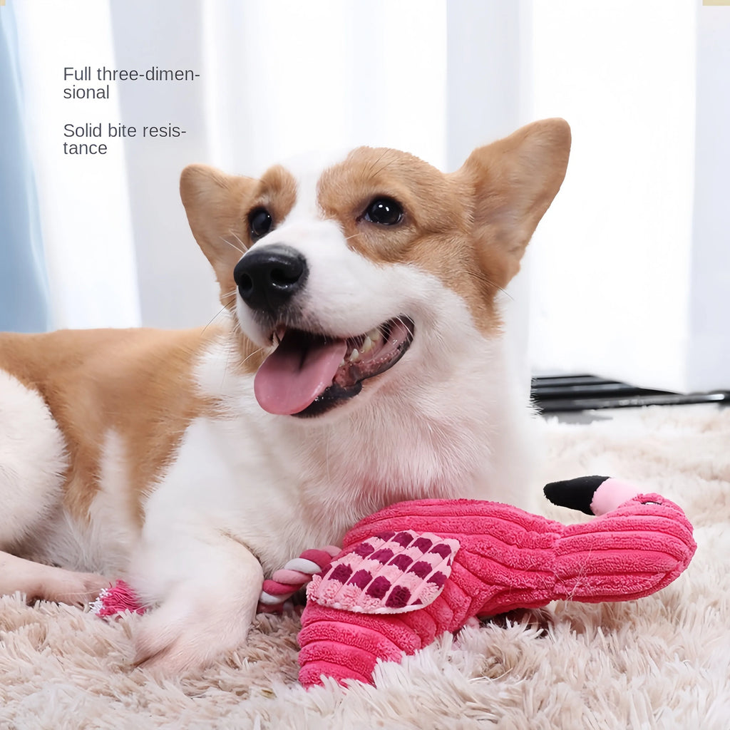Pink corduroy plush dog toy shaped like a lion, elephant, or giraffe with a squeaker.
