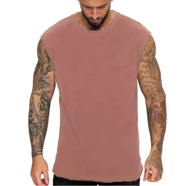Men's loose cotton tank top in dark grey showing straight hem design and sleeveless construction