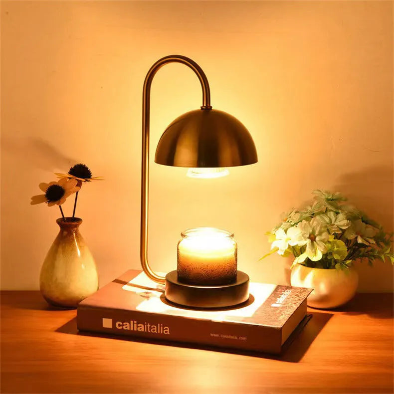 Solid wood base aromatherapy lamp with metal shade on a bedside table, with a wax melt dish.