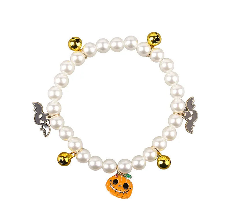 Purple simulated pearl Halloween cat collar decoration with a choice of ghost or pumpkin pendants.