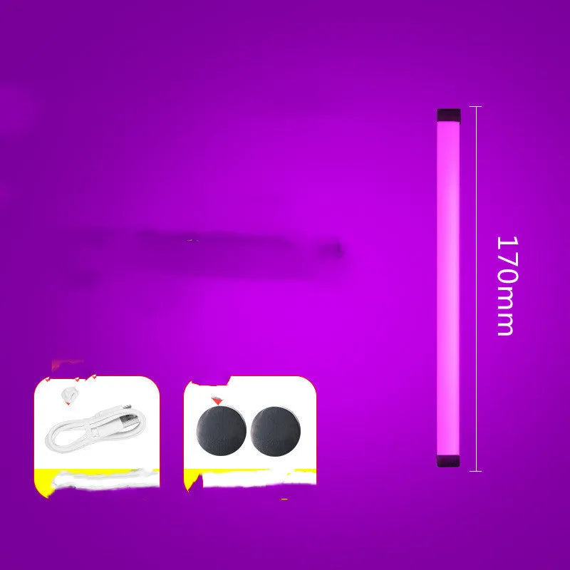 Rechargeable dimmable LED tube light in blue and purple colours shown in a bedroom setting.