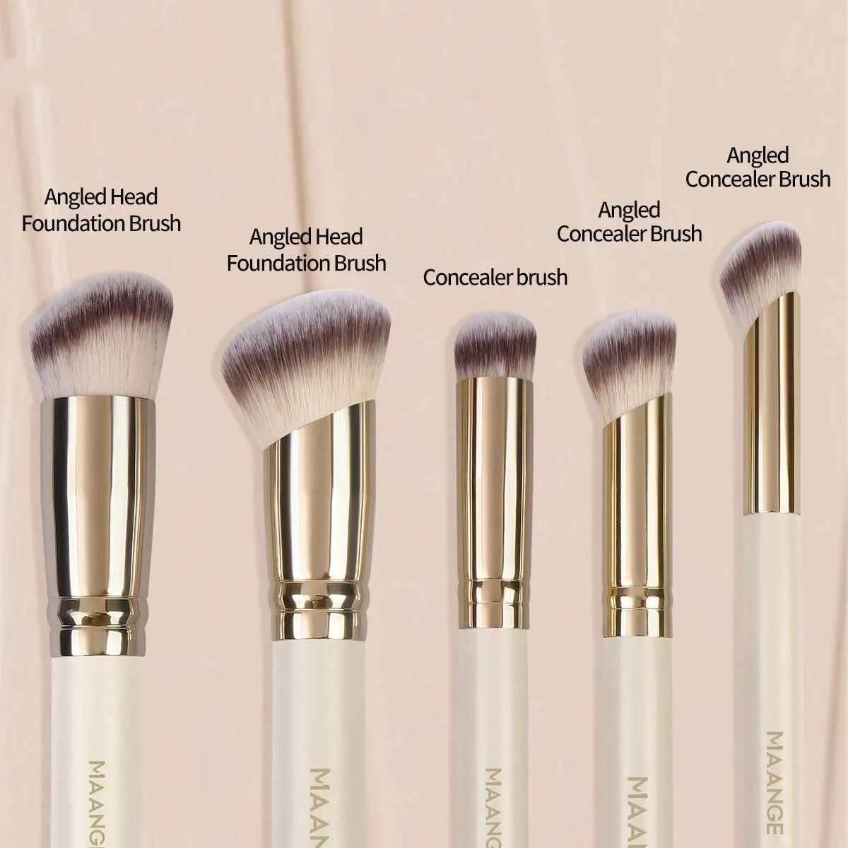 Five apricot-coloured makeup brushes with angled synthetic bristles for powder, blush and foundation application