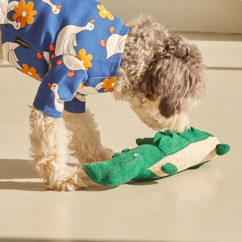 Green plush toy dog measuring 35cm long by 18cm high for interactive pet play