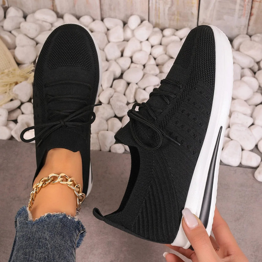 Women's fly-knit casual sneakers in black blue and red with artificial PU upper and low top design