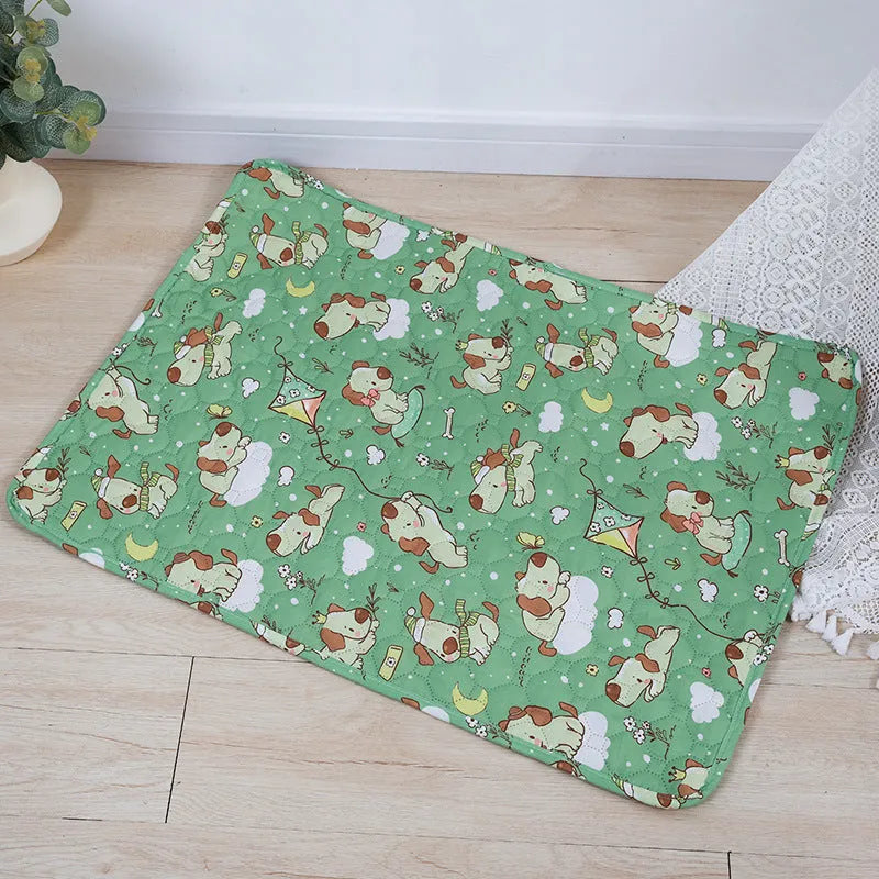 Reusable washable pet urine pad with colourful animal print and waterproof non-slip backing.