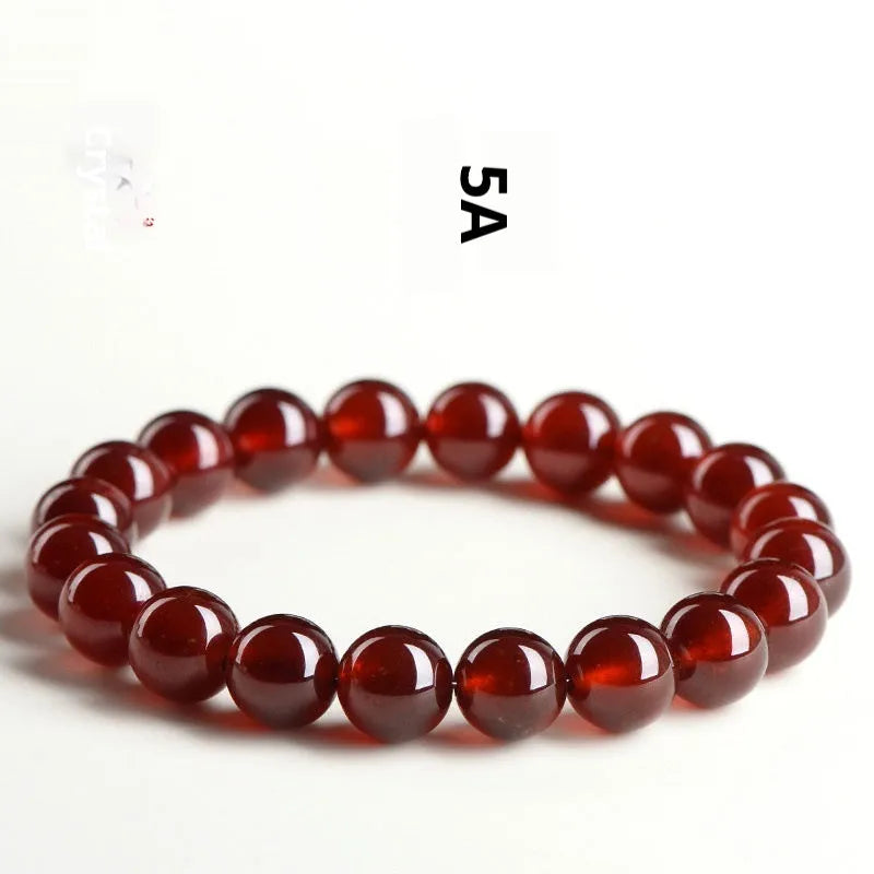 Natural orange red garnet crystal ball bracelet with Ruyi symbols in retro unisex design