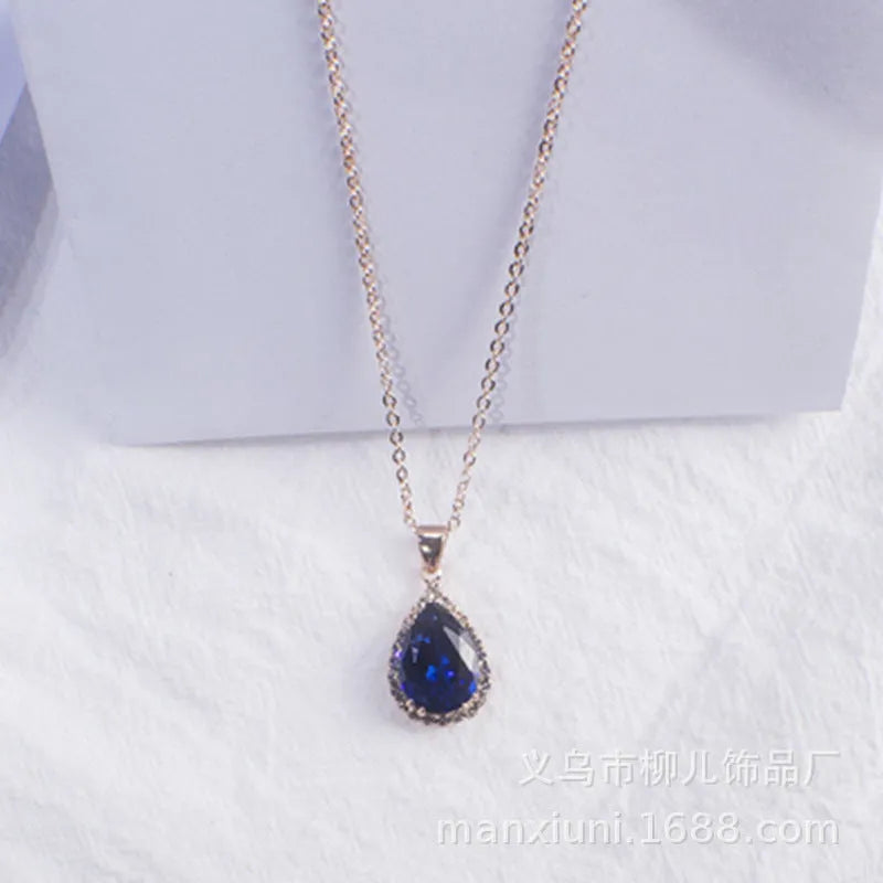 Rose gold pink drop shape women's necklace with geometric rhinestone detailing and alloy construction