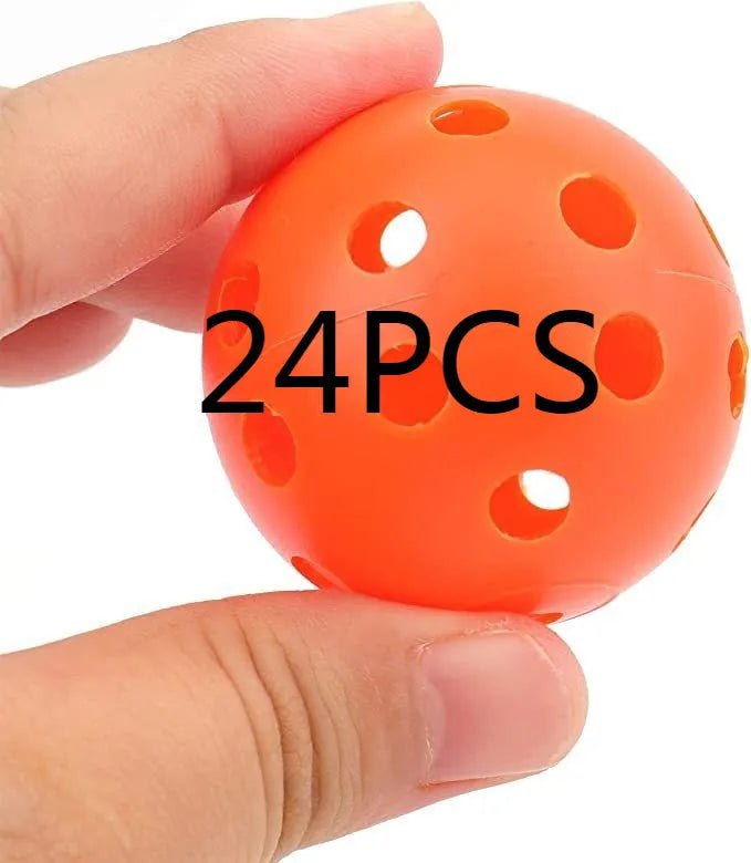 Six multi-colour 42mm golf practice balls in red, orange, blue, green, white, and yellow in a net.