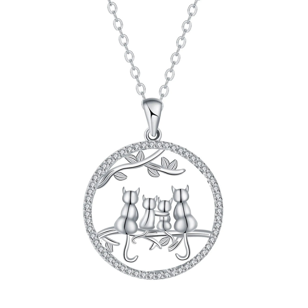Four kitten pendant necklace with copper chain and cross link design